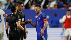 Jun 14, 2024; Landover, Maryland, USA; Argentina midfielder Lionel Messi (10) shakes hands with the match officials after a friendly against Guatemala at Commanders Field. Mandatory Credit: Geoff Burke-USA TODAY Sports