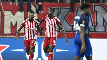 Olympiacos' Brazilian defender #23 Rodinei (L) and Olympiacos' Guinean midfielder #04 Mady Camara (R) celebrate after an own goal by West Ham United's Italian defender #21 Angelo Ogbonna during the UEFA Europa League 1st round day 3 Group A football match between Olympiacos (GRE) and West Ham (ENG) at the Georgios Karaiskakis Stadium in Piraus on October 26, 2023. (Photo by Yorgos Mantheos / Eurokinissi / AFP) / Greece OUT