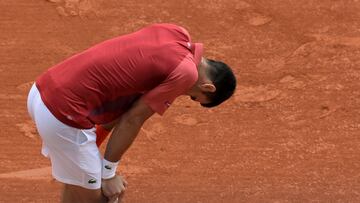 Serbia's Novak Djokovic reacts during his men's singles round of sixteen match against Argentina's Francisco Cerundolo on Court Philippe-Chatrier on day nine of the French Open tennis tournament at the Roland Garros Complex in Paris on June 3, 2024. (Photo by Bertrand GUAY / AFP)