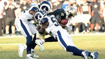 LOS ANGELES, CA - NOVEMBER 26: Trumaine Johnson #22 of the Los Angeles Rams and Alec Ogletree #52 of the Los Angeles Rams hit Michael Thomas #13 of the New Orleans Saints during the third quarter at the Los Angeles Memorial Coliseum on November 26, 2017 in Los Angeles, California.   Harry How/Getty Images/AFP
 == FOR NEWSPAPERS, INTERNET, TELCOS &amp; TELEVISION USE ONLY ==