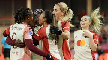 Lyon's Malawi forward #22 Tabitha Chawinga (2nd L) celebrates scoring the opening goal with her teammates during the UEFA Women's Champions League quarter-final first-leg football match FC Bayern Munich v Lyon in Munich, southern Germany, on March 18, 2025. (Photo by Alexandra BEIER / AFP)