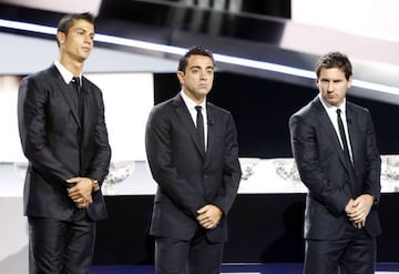 Cristiano together with Xavi and Messi at the FIFA Ballon d'Or ceremony