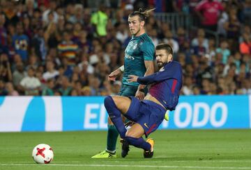 Gareth Bale y Gerard Piqué.