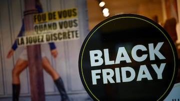 A Black Friday sale sign is displayed on a shop window in Nantes, France, November 26, 2024. REUTERS/Stephane Mahe