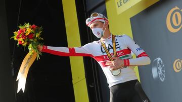 Cycling - Tour de France - Stage 15 - Lyon to Grand Colombier - France - September 13, 2020.  UAE Team Emirates rider Tadej Pogacar of Slovenia celebrates on the podium Pool via REUTERS/Thibault Camus