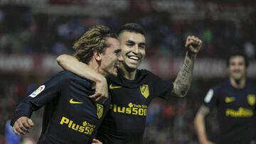 Football Soccer - Granada v Atletico Madrid - Spanish La Liga Santander - Nuevo los Carmenes Stadium, Granada, Spain, 11/3/17 Atletico Madrid's Antoine Griezmann celebrates with team mate Angel Correa scoring a goal. REUTERS/Jon Nazca
