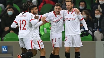 Sevilla&#039;s players celebrate after scoring a goal during the UEFA Champions League Group E second-leg football match between FK Krasnodar and Sevilla FC at the Krasnodar Stadium in Krasnodar on November 24, 2020. (Photo by Kirill KUDRYAVTSEV / AFP)