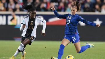 Nov 13, 2022; Harrison, New Jersey, USA; United States forward Alex Morgan (13) plays the ball against Germany forward Nicole Anyomi (25) during the first half at Red Bull Arena. Mandatory Credit: Vincent Carchietta-USA TODAY Sports