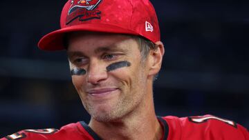 ARLINGTON, TEXAS - SEPTEMBER 11: Tom Brady #12 of the Tampa Bay Buccaneers is interviewed after the Buccaneers defeat the Dallas Cowboys 19-3 at AT&T Stadium on September 11, 2022 in Arlington, Texas.   Richard Rodriguez/Getty Images/AFP