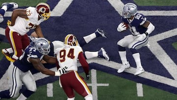 ARLINGTON, TX - NOVEMBER 24: Ezekiel Elliott #21 of the Dallas Cowboys carries the ball during the first half against the Washington Redskins at AT&amp;T Stadium on November 24, 2016 in Arlington, Texas.   Ronald Martinez/Getty Images/AFP
 == FOR NEWSPAPERS, INTERNET, TELCOS &amp; TELEVISION USE ONLY ==