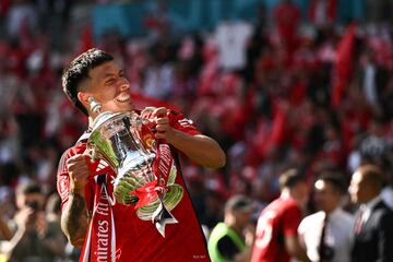 Silverware | Manchester United's Argentinian defender Lisandro Martinez celebrates with the English FA Cup.