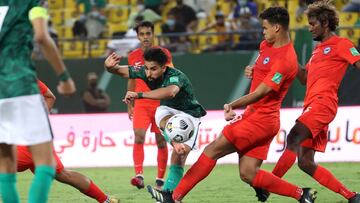 Saudi Arabia&#039;s Saleh al-Shehri kicks towards the goal during the 2022 FIFA World Cup qualification group D football match between Saudi Arabia and Singapore at the King Saud University Stadium in Riyadh on June 11, 2021. (Photo by Fayez Nureldine / A