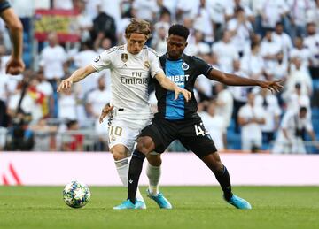 Modric y Dennis.