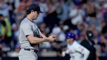 Jun 25, 2024; New York City, New York, USA; New York Yankees starting pitcher Gerrit Cole (45) reacts as New York Mets left fielder Brandon Nimmo (9) rounds the bases after hitting a two run home run during the fourth inning at Citi Field. Mandatory Credit: Brad Penner-USA TODAY Sports