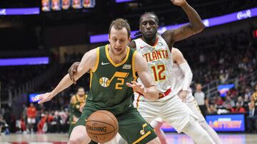 Mar 21, 2019; Atlanta, GA, USA; Utah Jazz forward Joe Ingles (2) and Atlanta Hawks forward Taurean Prince (12) battle for the ball during the second half at State Farm Arena. Mandatory Credit: Dale Zanine-USA TODAY Sports