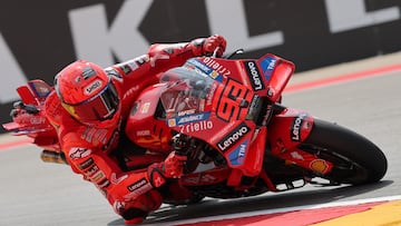 Ducati Lenovo Team's Spanish rider Marc Marquez takes a curve during the second free practice on June 6, 2025, ahead of the MotoGP Aragon Grand Prix at the Motorland circuit in Alcaniz, northeastern Spain. (Photo by LLUIS GENE / AFP)