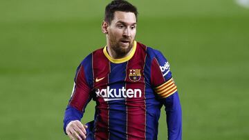 BARCELONA, SPAIN - FEBRUARY 13: Lionel Messi of FC Barcelona follows the action during the La Liga Santander match between FC Barcelona and Deportivo Alav&Atilde;&copy;s at Camp Nou on February 13, 2021 in Barcelona, Spain. Sporting stadiums around Spain 