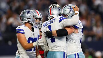 Nov 12, 2023; Arlington, Texas, USA;  Dallas Cowboys quarterback Dak Prescott (4) celebrates with teammates after scoring a touchdown  during the second quarter against the New York Giants at AT&T Stadium. Mandatory Credit: Kevin Jairaj-USA TODAY Sports