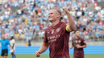 Manchester City's Norwegian striker #09 Erling Haaland smiles after scoring his third goal during the second half of the pre-season club friendly football match between Manchester City and Chelsea at Ohio Stadium in Columbus, Ohio, August 3, 2024. (Photo by KAMIL KRZACZYNSKI / AFP)