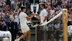 Tennis - Wimbledon - All England Lawn Tennis and Croquet Club, London, Britain - July 14, 2024 Spain's Carlos Alcaraz shakes hands with Serbia's Novak Djokovic after winning the men's singles final REUTERS/Paul Childs