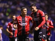 Adrian Mora celebrates his goal 1-3 with Uros Durdevic of Atlas during the 1st round match between Puebla and Atlas as part of the Liga BBVA MX, Torneo Apertura 2025 at Cuauhtemoc Stadium, on July 11, 2025 in Puebla, Mexico