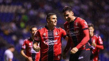Adrian Mora celebrates his goal 1-3 with Uros Durdevic of Atlas during the 1st round match between Puebla and Atlas as part of the Liga BBVA MX, Torneo Apertura 2025 at Cuauhtemoc Stadium, on July 11, 2025 in Puebla, Mexico
