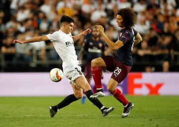 Matteo Guendouzi y Carlos Soler.