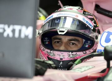 Force India driver Sergio Perez of Mexico waits in his car during the third practice session for the Japanese Formula One Grand Prix at Suzuka, Japan, Saturday, Oct. 7, 2017. (AP Photo/Eugene Hoshiko)