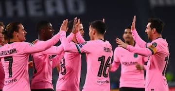 Ousmane Dembele (2nd L)) celebrates with teammates scoring his team's first goal during the UEFA Champions League Group G football match between Juventus and Barcelona on October 28, 2020.