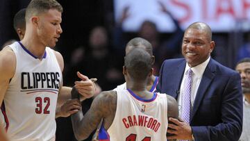 March 6, 2017; Los Angeles, CA, USA; Los Angeles Clippers head coach Doc Rivers and forward Blake Griffin (32) help up guard Jamal Crawford (11) after he scoes a three point basket and draws the foul against the Boston Celtics during the second half at Staples Center. Mandatory Credit: Gary A. Vasquez-USA TODAY Sports