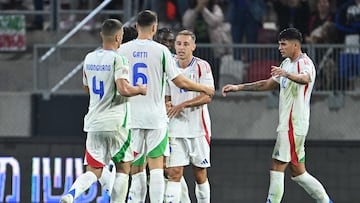 Italy's midfielder #16 Davide Frattesi (2nd R) celebrates scoring the opening goal with his teammates during the UEFA Nations League, League A, Group A2 football match Israel vs Italy at the Bozsik Arena in Budapest, Hungary, on September 9, 2024. (Photo by Attila KISBENEDEK / AFP)