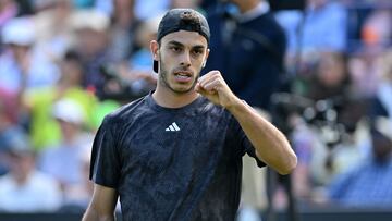 Argentina's Francisco Cerundolo reacts while playing US player Tommy Paul during their men's singles final tennis match at the Rothesay Eastbourne International tennis tournament in Eastbourne, southern England, on July 1, 2023. (Photo by Glyn KIRK / AFP)