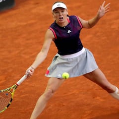 Wozniacki suma otra retirada y Collins se cita con Muguruza