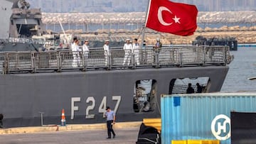 The Turkish national flag flies on the stern of the Turkish Navy Turkish frigate (F-247) TCG Kemalreis as seamen stand aboard the deck while docked at Israel's northern port of Haifa during a NATO naval exercise on September 3, 2022. - The TCG Kemalreis is the first Turkish naval ship to arrive in Israel since ties ruptured in 2010, following a confrontation between Israeli special forces and Turkish peace activists aboard a civilian vessel that had tried to breach the naval blockade on the Gaza Strip. The ship, along with other NATO vessels, are expected to remain in Israel for several days. (Photo by JACK GUEZ / AFP) (Photo by JACK GUEZ/AFP via Getty Images)