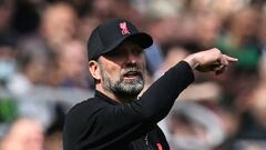 Liverpool's German manager Jurgen Klopp reacts during the English Premier League football match between Newcastle United and Liverpool at St James' Park in Newcastle-upon-Tyne, north east England on April 30, 2022. - RESTRICTED TO EDITORIAL USE. No use with unauthorized audio, video, data, fixture lists, club/league logos or 'live' services. Online in-match use limited to 120 images. An additional 40 images may be used in extra time. No video emulation. Social media in-match use limited to 120 images. An additional 40 images may be used in extra time. No use in betting publications, games or single club/league/player publications. (Photo by Paul ELLIS / AFP) / RESTRICTED TO EDITORIAL USE. No use with unauthorized audio, video, data, fixture lists, club/league logos or 'live' services. Online in-match use limited to 120 images. An additional 40 images may be used in extra time. No video emulation. Social media in-match use limited to 120 images. An additional 40 images may be used in extra time. No use in betting publications, games or single club/league/player publications. / RESTRICTED TO EDITORIAL USE. No use with unauthorized audio, video, data, fixture lists, club/league logos or 'live' services. Online in-match use limited to 120 images. An additional 40 images may be used in extra time. No video emulation. Social media in-match use limited to 120 images. An additional 40 images may be used in extra time. No use in betting publications, games or single club/league/player publications. (Photo by PAUL ELLIS/AFP via Getty Images)