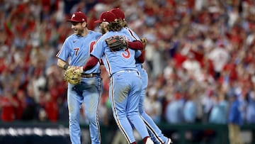 PHILADELPHIA, PENNSYLVANIA - OCTOBER 12: Trea Turner #7, Alec Bohm #28, and Bryce Harper #3 of the Philadelphia Phillies celebrate after beating the Atlanta Braves 3-1 in Game Four of the Division Series at Citizens Bank Park on October 12, 2023 in Philadelphia, Pennsylvania. Tim Nwachukwu/Getty Images/AFP (Photo by Tim Nwachukwu / GETTY IMAGES NORTH AMERICA / Getty Images via AFP)