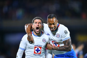   Jose Rivero celebrates his goal 0-2 with Willer Ditta of Cruz Azul during the 14th round match between Pumas UNAM and Cruz Azul as part of the Liga BBVA MX, Torneo Apertura 2024 at Olimpico Universitario Stadium on October 26, 2024 in Mexico City, Mexico.