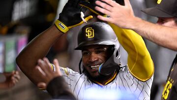 Sep 18, 2023; San Diego, California, USA; San Diego Padres third baseman Eguy Rosario (5) is congratulated in the dugout after hitting a home run against the Colorado Rockies during the third inning at Petco Park. Mandatory Credit: Orlando Ramirez-USA TODAY Sports