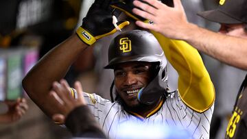 Sep 18, 2023; San Diego, California, USA; San Diego Padres third baseman Eguy Rosario (5) is congratulated in the dugout after hitting a home run against the Colorado Rockies during the third inning at Petco Park. Mandatory Credit: Orlando Ramirez-USA TODAY Sports