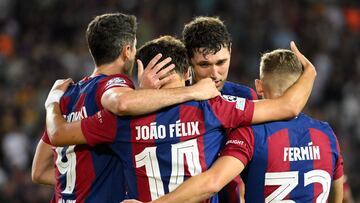 Barcelona's Portuguese forward #14 Joao Felix celebrates with teammates after scoring his team's fifth goal during the UEFA Champions League 1st round day 1 Group H football match between FC Barcelona and Royal Antwerp FC at the Estadi Olimpic Lluis Companys in Barcelona on September 19, 2023. (Photo by Josep LAGO / AFP)