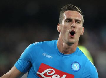 Napoli's Polish forward Arkadiusz Milik celebrates after scoring during the Italian Serie A football match SSC Napoli vs Bologna FC on September 17, 2016 at the San Paolo stadium in Naples.