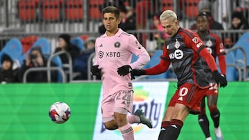 Mar 18, 2023; Toronto, Ontario, CAN; Toronto FC midfielder Federico Bernardeschi (10) shoots the ball past Inter Miami midfielder Nicolas Stefanelli (22) in the first half at BMO Field. Mandatory Credit: Dan Hamilton-USA TODAY Sports