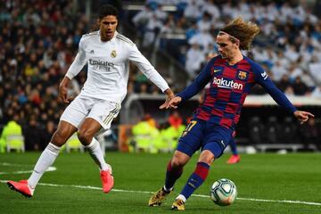 Griezmann in action against Real Madrid's Raphael Varane.