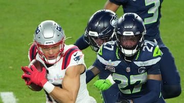 Feb 8, 2026; Santa Clara, CA, USA; New England Patriots wide receiver Mack Hollins (13) catches a pass against Seattle Seahawks cornerback Riq Woolen (27) in the second half in Super Bowl LX at Levi's Stadium. Mandatory Credit: Kirby Lee-Imagn Images