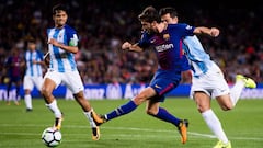 Barça sigue líder con triunfo a Málaga y gol polémico