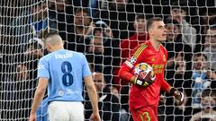 Manchester City's Croatian midfielder #08 Mateo Kovacic reacts after having his penalty kick saved during the penalty shootout during the UEFA Champions League quarter-final second-leg football match between Manchester City and Real Madrid, at the Etihad Stadium, in Manchester, north-west England, on April 17, 2024. (Photo by Paul ELLIS / AFP)