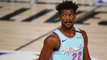 Miami Heat forward Jimmy Butler waits between plays during the first half of the team's NBA basketball game against the Indiana Pacers on Monday, Aug. 10, 2020, in Lake Buena Vista, Fla. (Kim Klement/Pool Photo via AP)