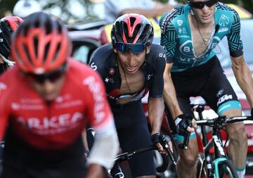 Team Ineos rider Colombia's Egan Bernal (C) climbs the Grand Colombier pass behind the leader's group during the 15th stage of the 107th edition of the Tour de France cycling race, 175 km between Lyon and Grand Colombier, on September 13, 2020. (Photo by KENZO TRIBOUILLARD / AFP)