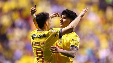 Soccer Football - Liga MX - Final - First Leg - America v Monterrey - Estadio Cuauhtemoc, Puebla, Mexico - December 12, 2024 America's Kevin Alvarez celebrates scoring their first goal with America's Alvaro Fidalgo REUTERS/Raquel Cunha