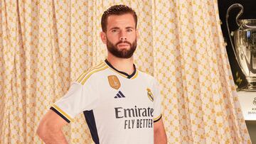 Nacho Fernández, defensa del Real Madrid  posando con la primera equipación del Real Madrid para la temporada 23/24.